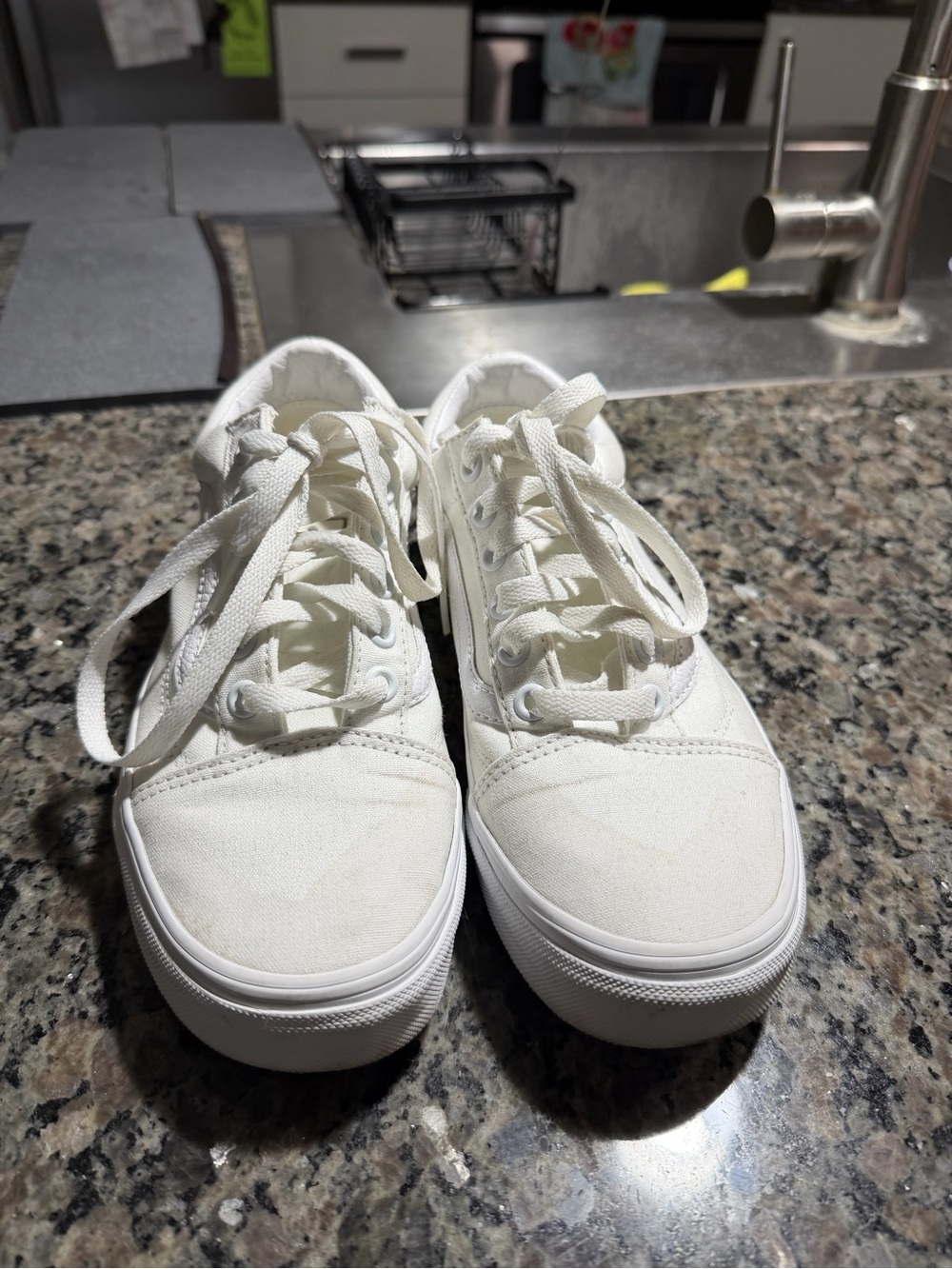 Vans women’s white canvas sneakers